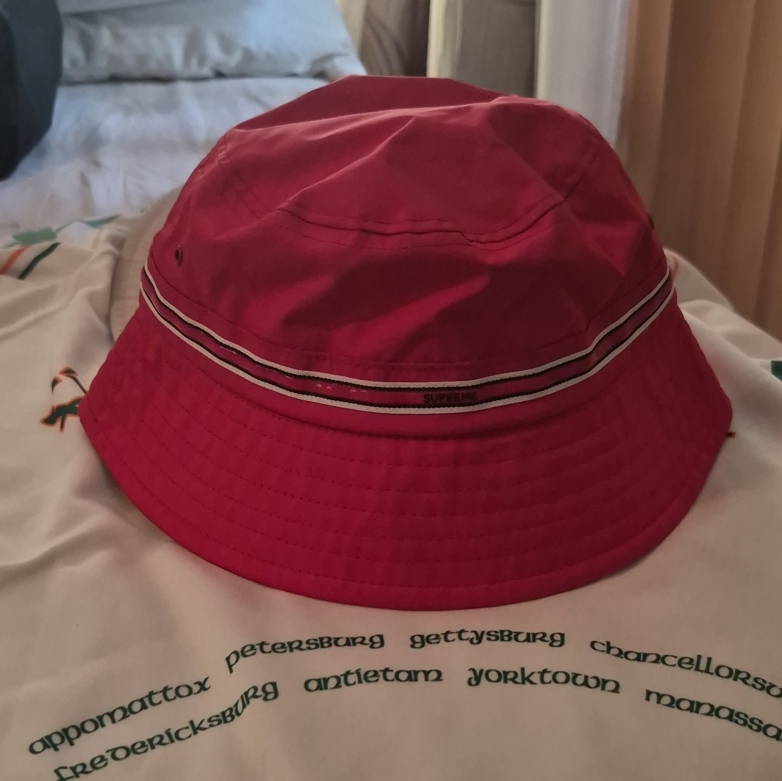 Supreme N.Y.C Red Bucket Hat with Silicone Stripe across crown water resistant