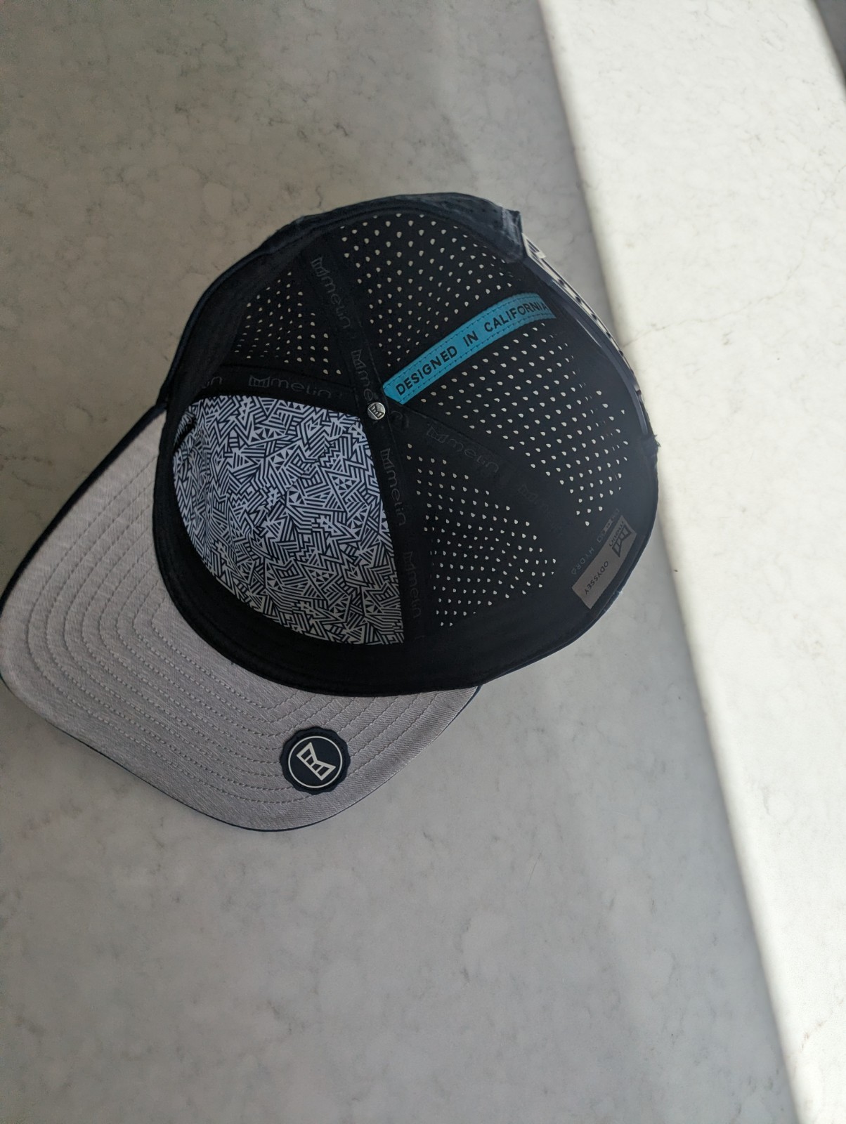 MELIN Odysea Stacked Hydro Performance Snapback Hat Navy, Men’s Size M