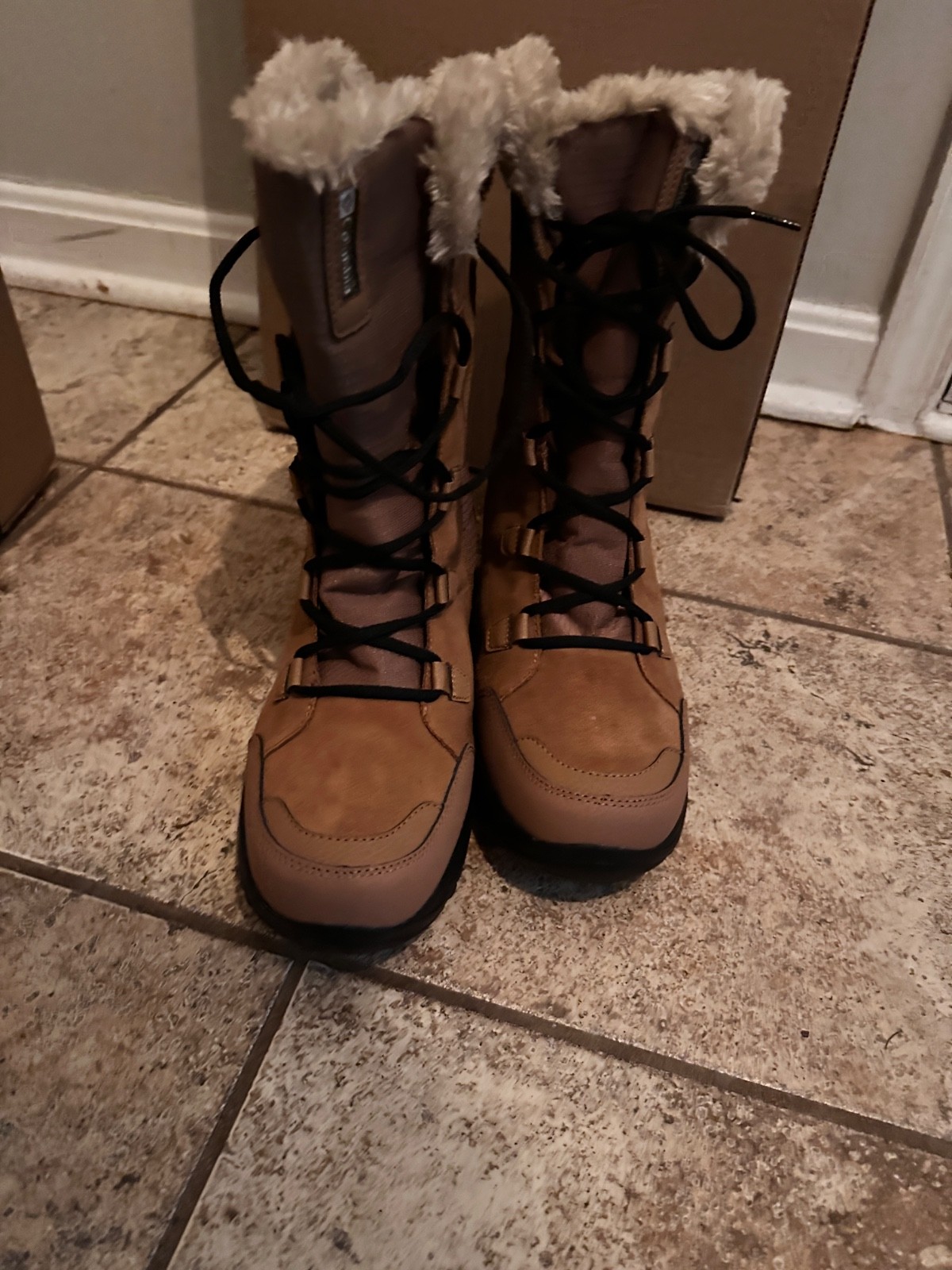 Tan fur lined water proof snow boots