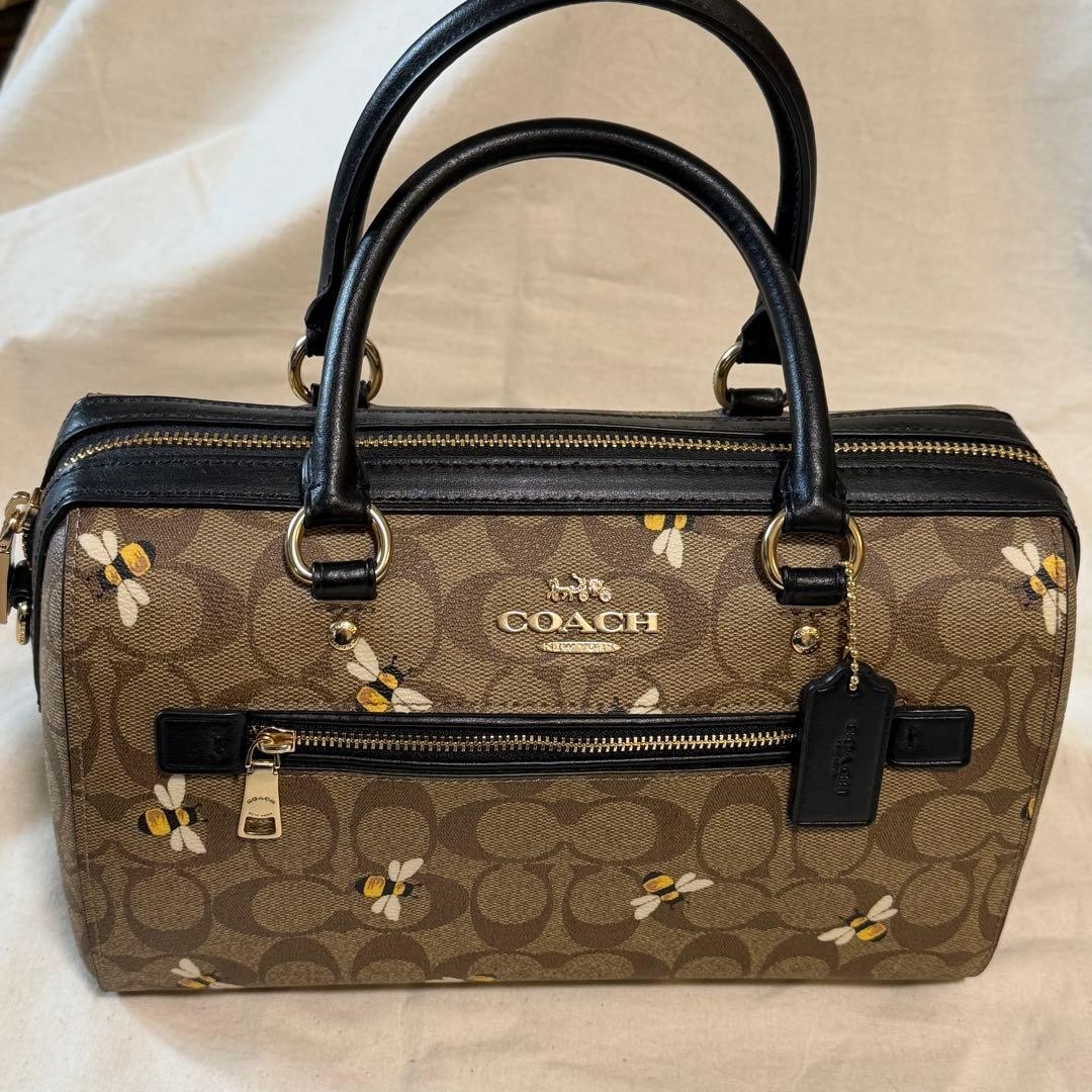 COACH Signature Bee Motif Boston Handbag 8.5 inches Brown/Black PVC Canvas