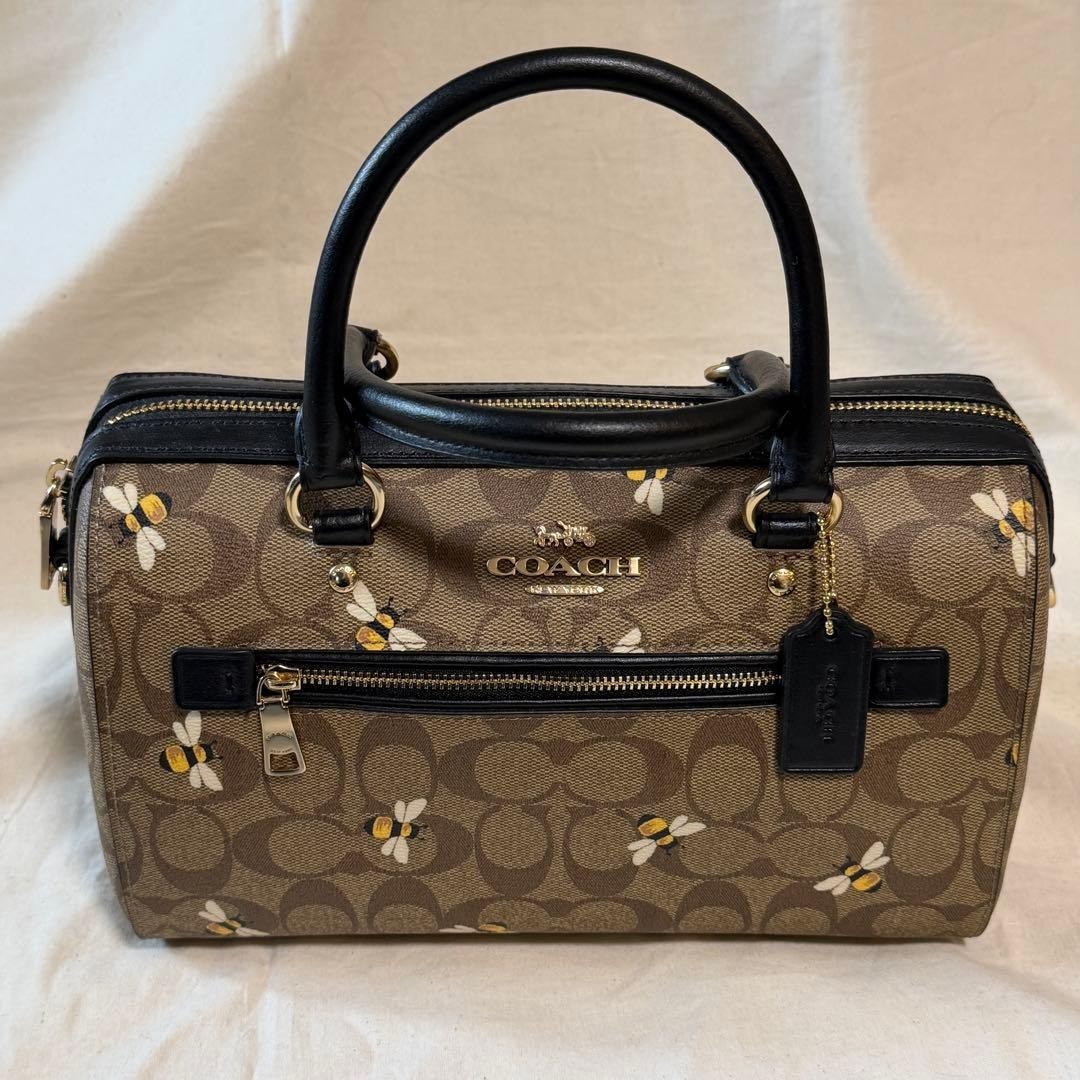COACH Signature Bee Motif Boston Handbag 8.5 inches Brown/Black PVC Canvas