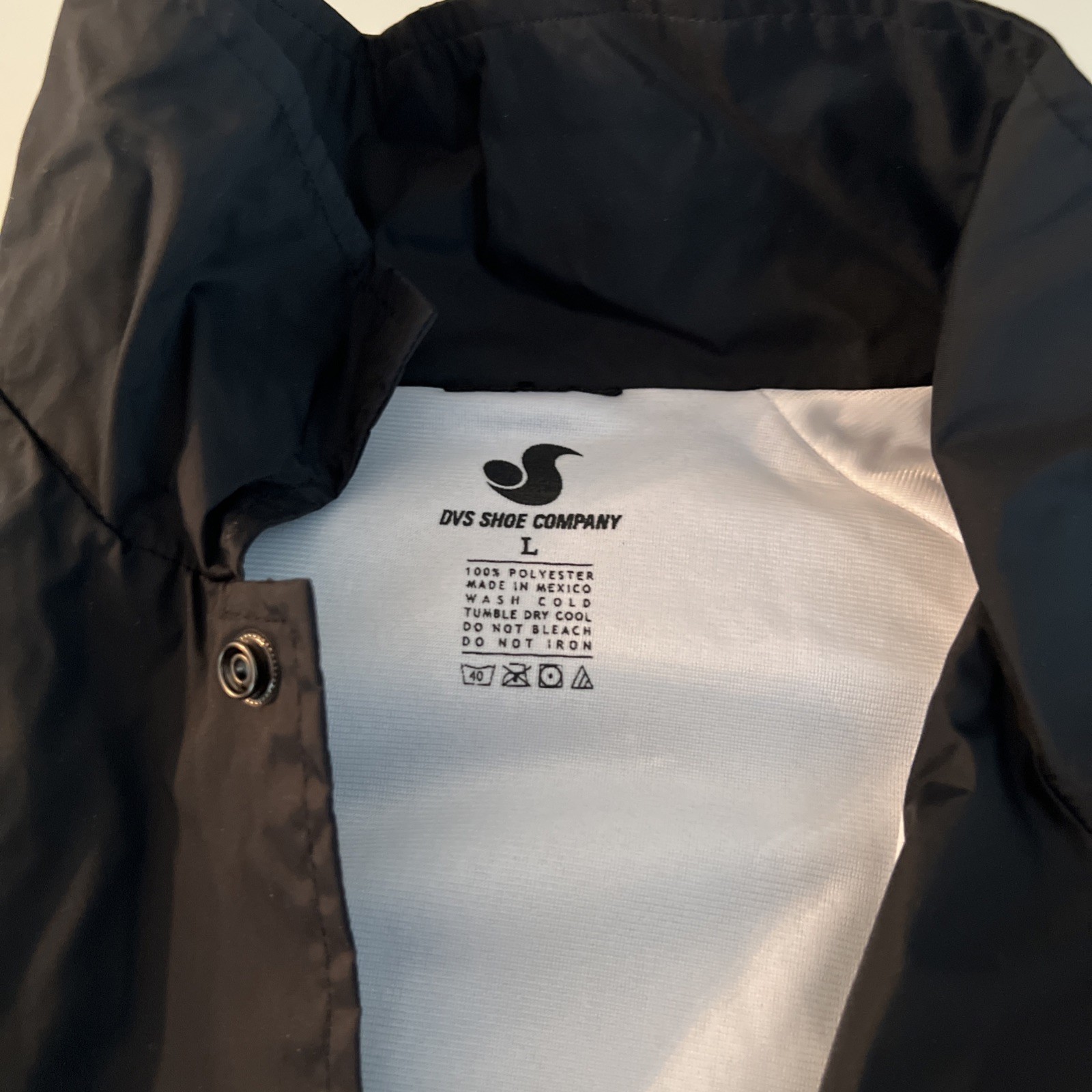 DVS Skate Shoe Company Men’s XL black nylon lined jacket New W/O Tags.