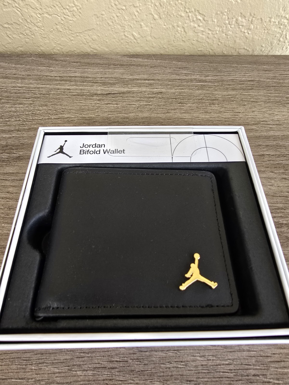 $65…Jordan Bifold Wallet Black with Gold Jumpman.